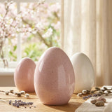 Aufsteller Mylana Porzellan-Eier in Rosa und Weiß mit gesprenkelter Glasur