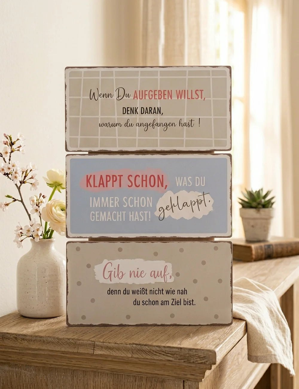 Schild "Motivation" – dekoriert im Wohnambiente